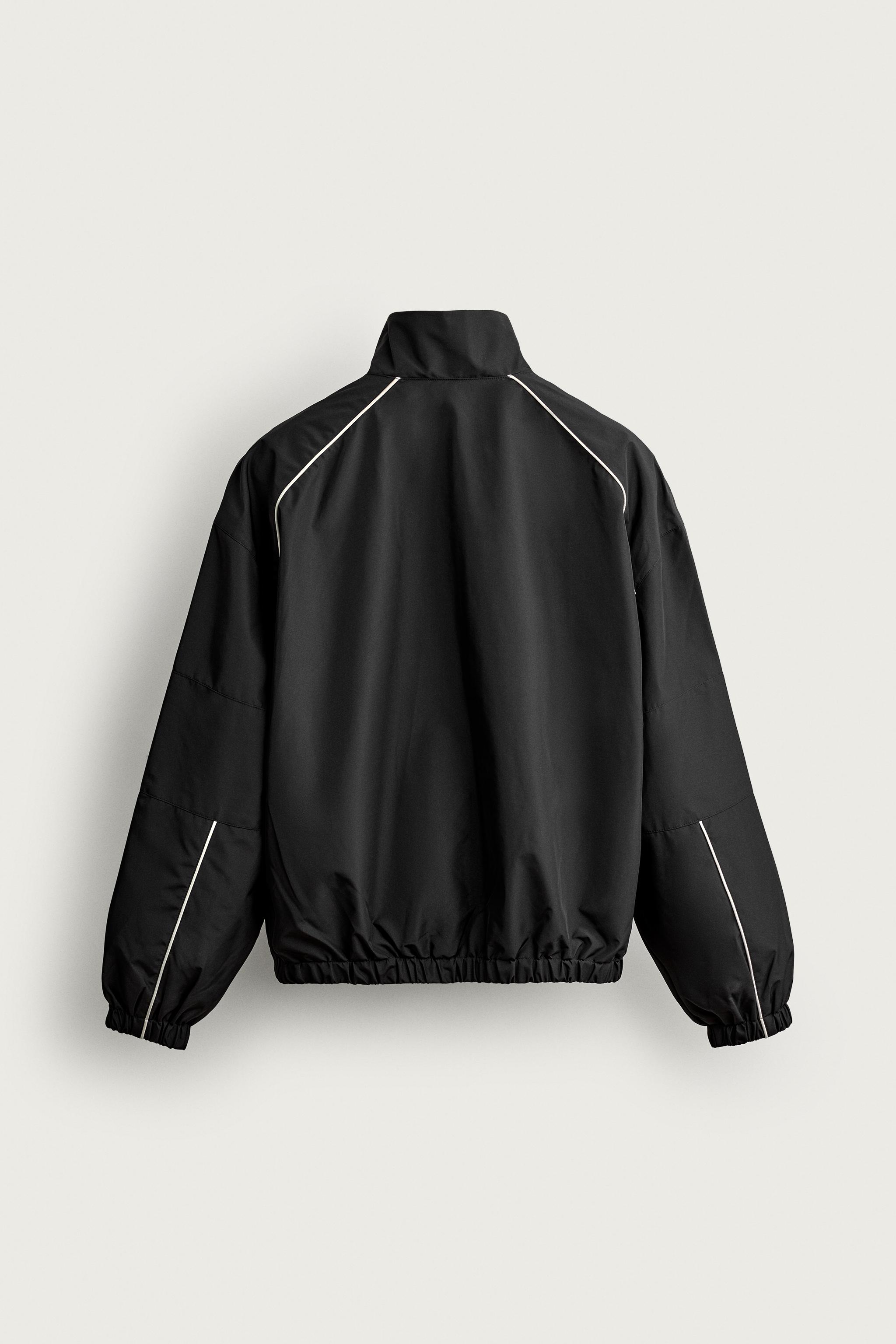 VESTE TECHNIQUE À CONTRASTES DÉPERLANTE